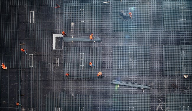 Contractors working on a big construction project building BIM