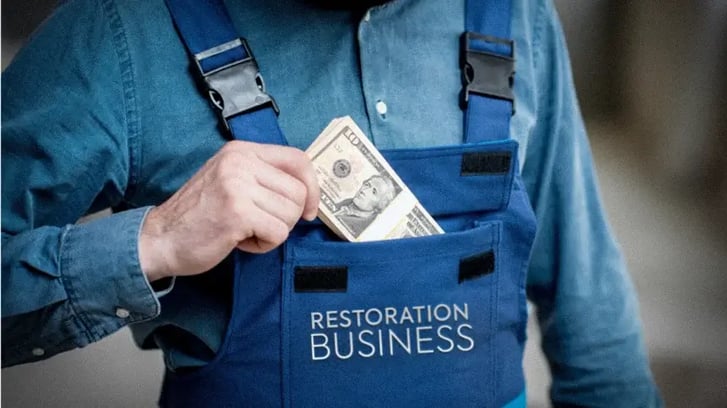 Text: Restoration Business (a restorer contractor man pulling a heap of cash of dollars from his blue chest pocket