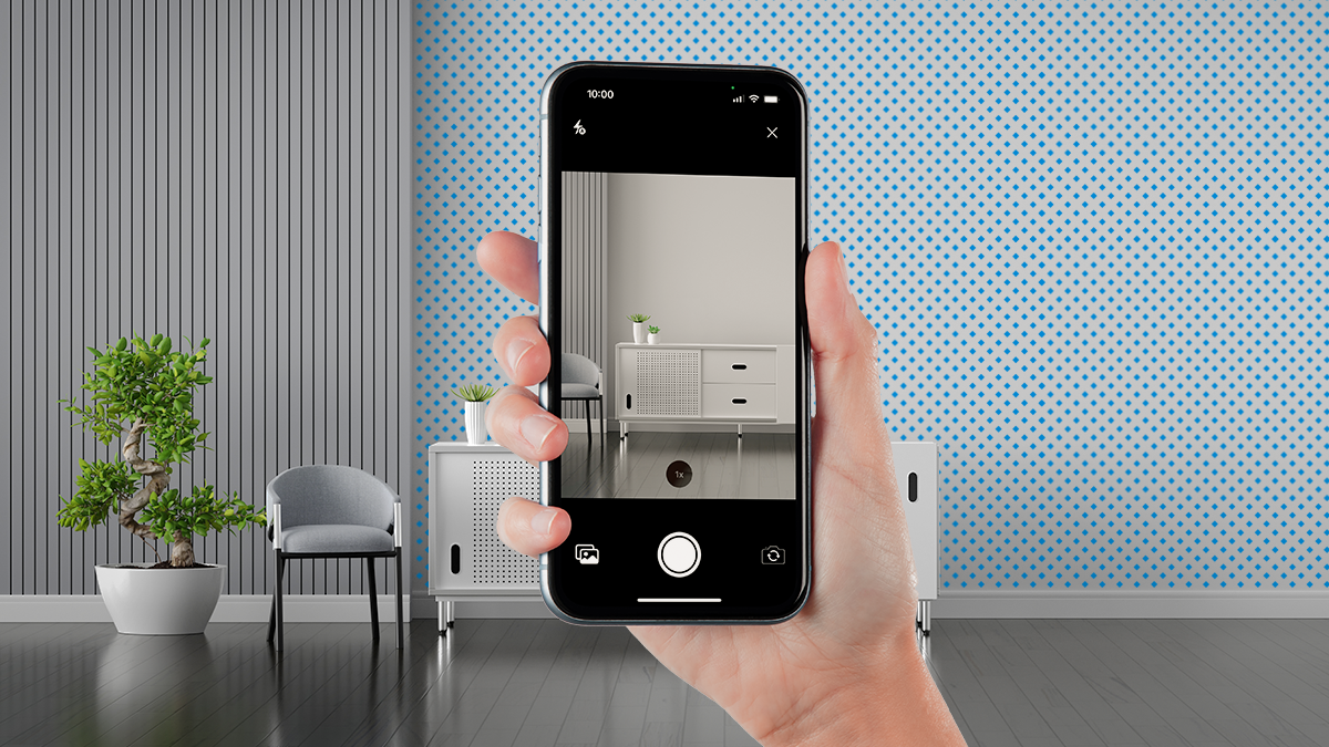 painter hand scanning a room with a mobile device floor plan to create estimate
