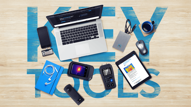 Key Tools for Restoration Contractors in a table including a flir thermal camera, handbook, moisture meter, ipad, laptop, drive and coffee