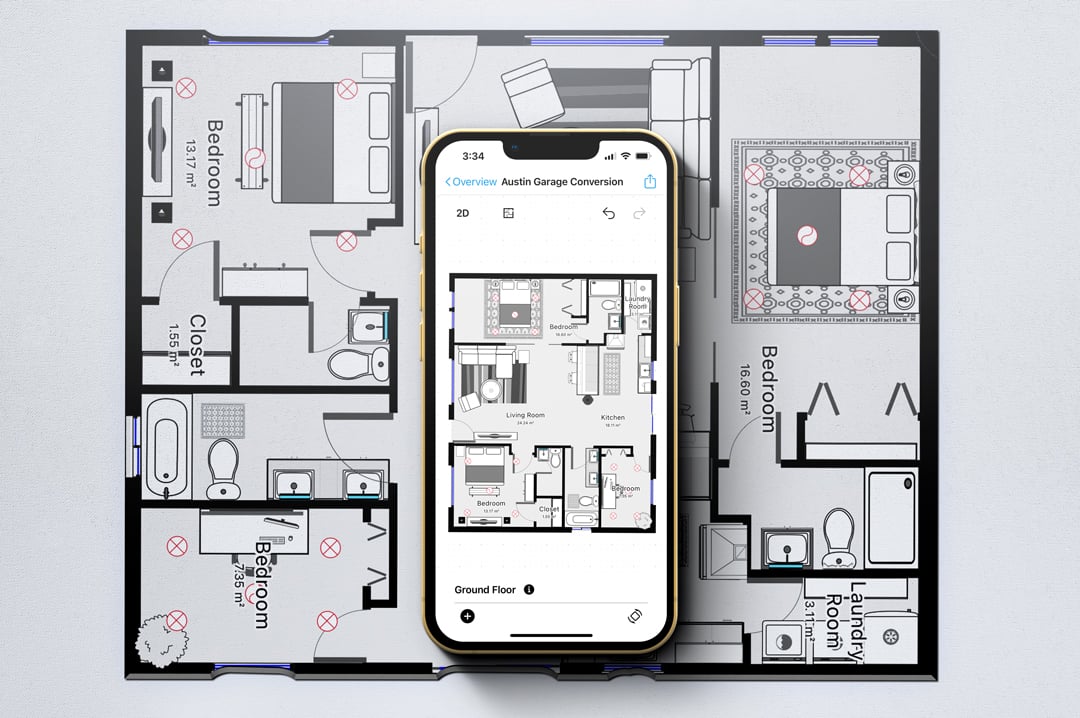 magicplan floor plan shown on a smartphone screen against an annotated bigger floor plan