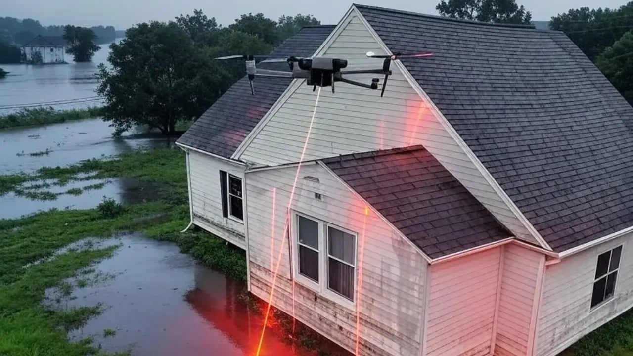Drone scanning a house after water damage from a hurricane flood in a CAT job.